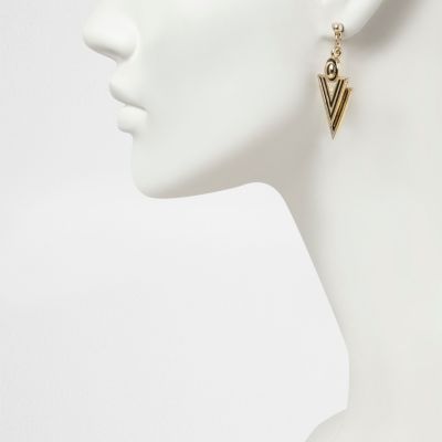 Gold tone stripe spike stud earrings